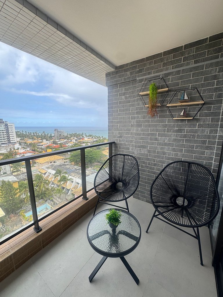 Studio aconchegante com vista para o mar
