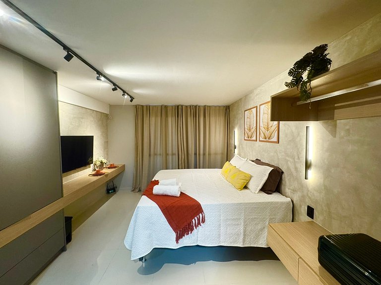 Studio moderno e elegante com vista para o mar