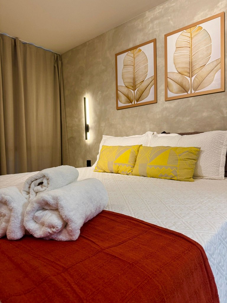 Studio moderno e elegante com vista para o mar