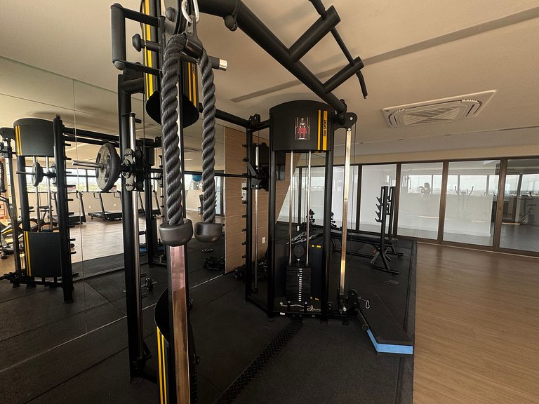 Studio moderno e elegante com vista para o mar